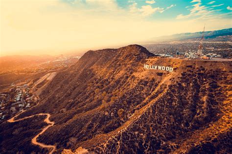 Download Iconic Hollywood Sign In Los Angeles Wallpaper | Wallpapers.com