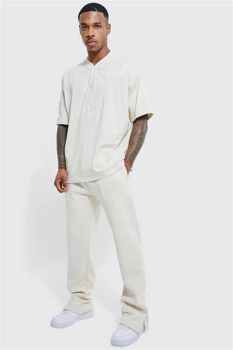 Bm Embossed Baseball Polo And Jogger Set Boohoo Uk