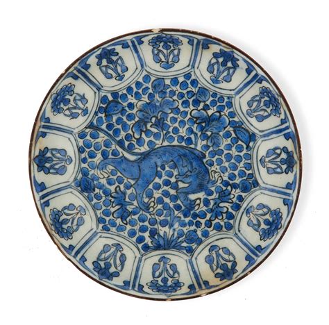 Bid Now A Safavid Blue And White Pottery Dish Depicting A Lion Persia