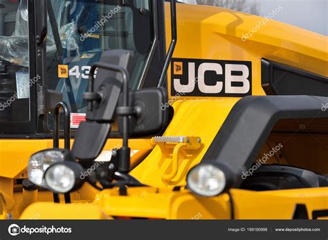 JCB Heavy Duty Equipment Vehicle And Logo Stock Editorial Photo