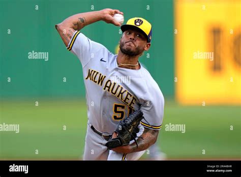 Milwaukee Brewers Starting Pitcher Freddy Peralta Delivers During The