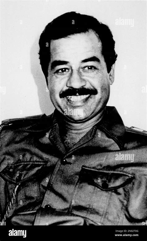 Iraqi President Saddam Hussein Is Pictured In Military Uniform In Iraq