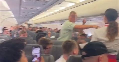 Ryanair Passenger Tries To Open Plane Door Before He S Tackled By Hero