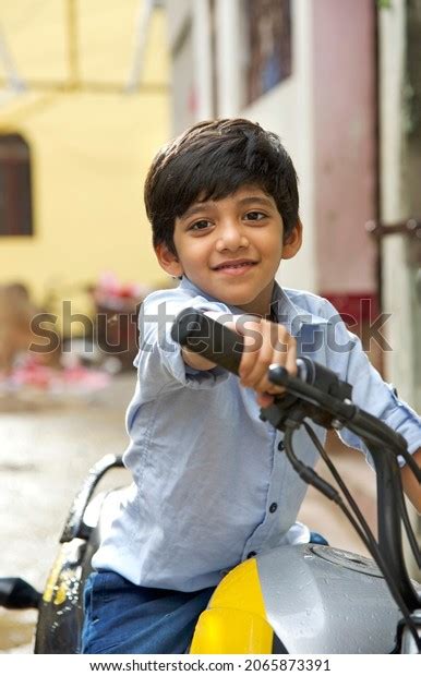 Cute Indian Boy Seating On Bike Stock Photo 2065873391 Shutterstock