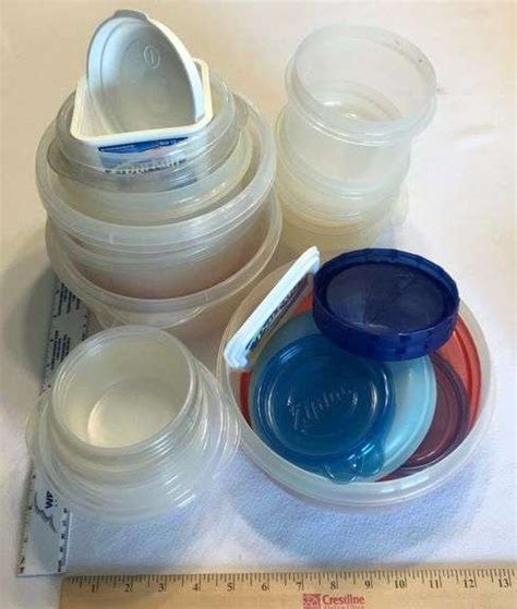 Assorted Plastic Containers & Lids - Sherwood Auctions