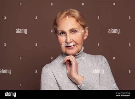 Smiling Middle Aged Mature Woman Looking At Camera Stock Photo Alamy