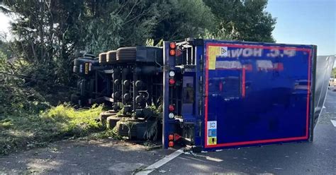 Huge M6 Delays As Lorry Overturns Before Car Collides With Barrier