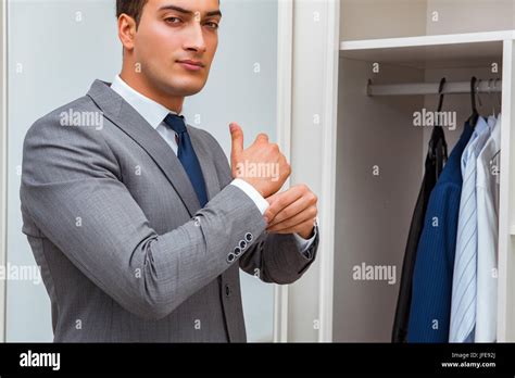 Businessman Dressing Up For Work Stock Photo Alamy