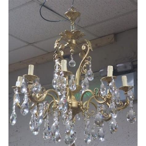 A CONTINENTAL GILT BRASS AND CUT GLASS EIGHT BRANCH CHANDELIER The