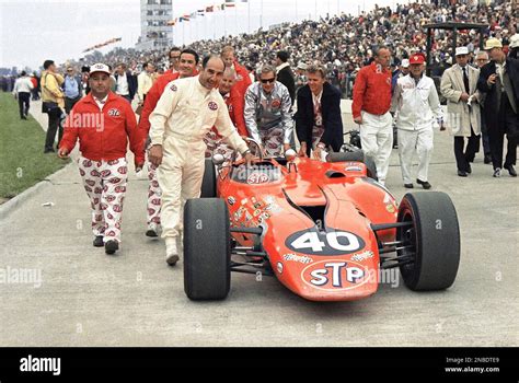 Crew Members Push The Stp Paxton Turbine Powered Car Of Parnelli Jones