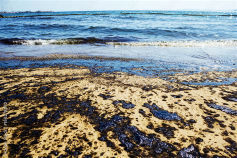 Texture Of Crude Oil Spill On Sand Beach From Oil Spill Accident Agios