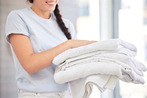 Clean Towels Laundry And Woman Doing Washing While Working For