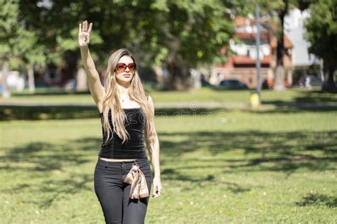 Portrait Of Blonde Woman Posing In A Park Stock Image Image Of Hair Park 305974223