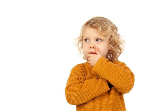 Premium Photo Portrait Of Cute Girl Standing Against White Background
