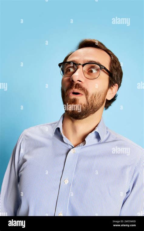 Half Length Portrait Of Mature Bearded Man In Eyewear Expressing Vivid