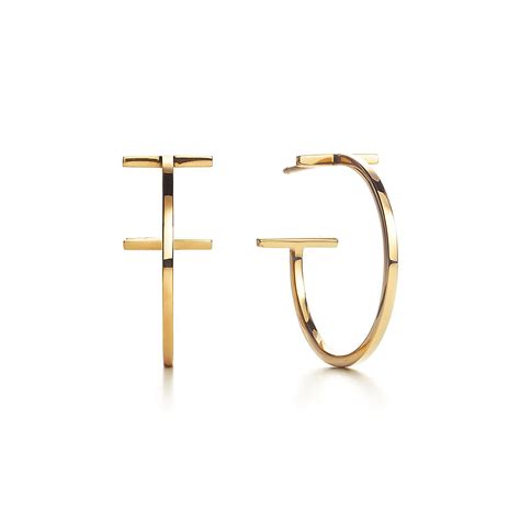 Tiffany T wire hoop earrings in 18k gold, medium. | Tiffany & Co.