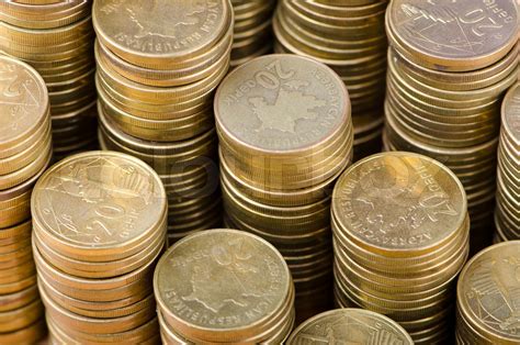 Golden coins in high stacks | Stock image | Colourbox