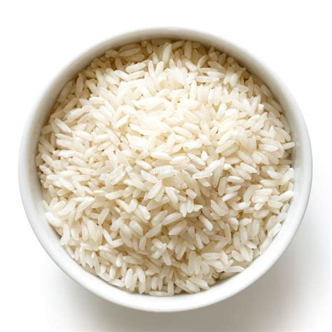 Cuenco De Arroz Moreno De Grano Largo Aislado En Blanco Imagen De