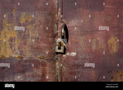 Old metal door with rust Stock Photo - Alamy