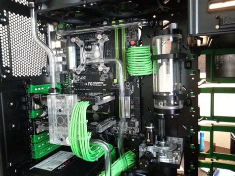 The Inside Of A Black And Green Computer Case