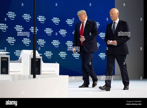 President Donald Trump Arrives With World Economic Forum Founder And