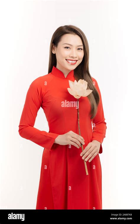 Los Vietnamitas Chica Sujetando Una Flor De Loto El Ao Dai Long