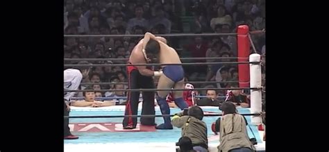 Shinya Hashimoto gives Takada a BrainBuster from Hell. Tokyo Dome fans ...