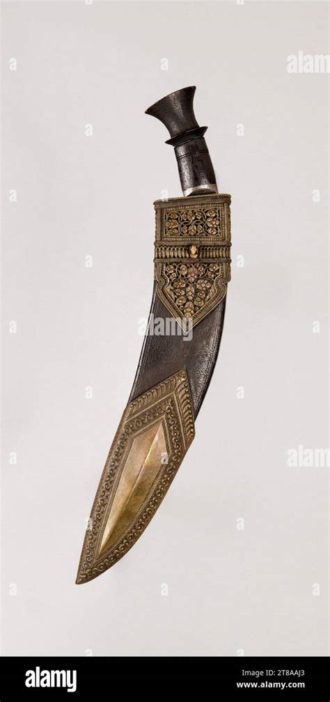 Knife (Kukri), c. 1750–1800. Nepal. Steel with etched surface and wooden handle, leather covered ...