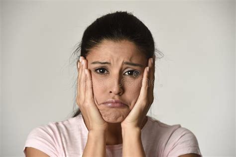 Young Beautiful Hispanic Sad Woman Serious And Concerned In Worried