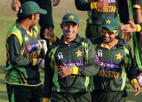 Saeed Ajmal celebrates the win with team-mates | ESPNcricinfo.com