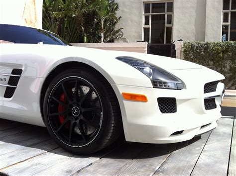 White Mercedes SLS AMG with black rims | Exotic Cars on the Streets of Miami