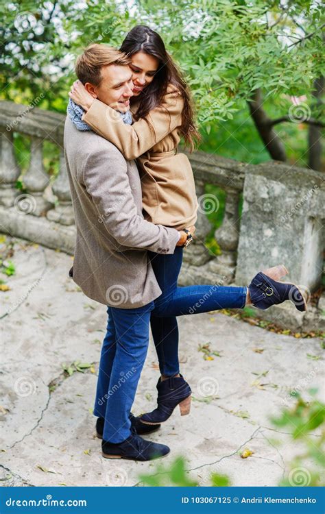 View From Above A Loving Young Couple Hugging In A Park In Autumn