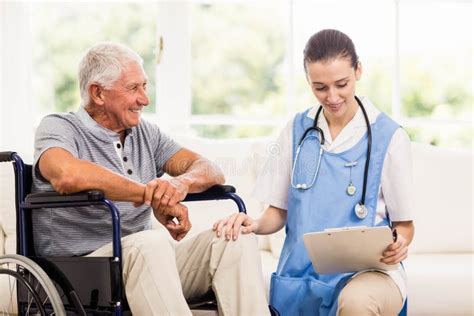 Doctor Checking Patients Health Stock Photo Image Of Homey