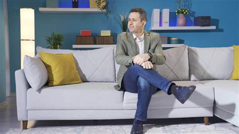 Thoughtful And Sad Mature Man Alone At Home Depressed And Thoughtful