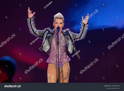 Pink Singer Photos, Images & Pictures | Shutterstock