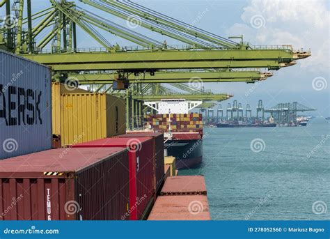 View On The Containers Loaded On Deck Of The Cargo Ship Berthed At