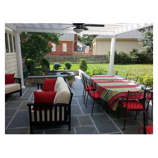 Outdoor Kitchen And Pergola With A Bluestone Patio Traditional