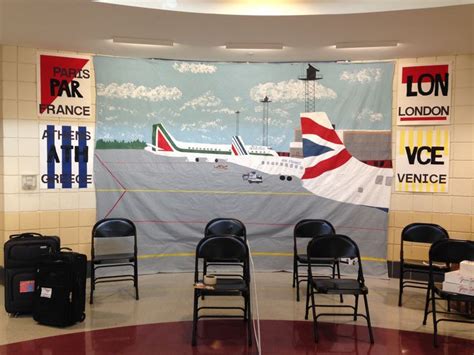 Lobby Was Decorated Like An Airport Mural Painted On Painters Tarp