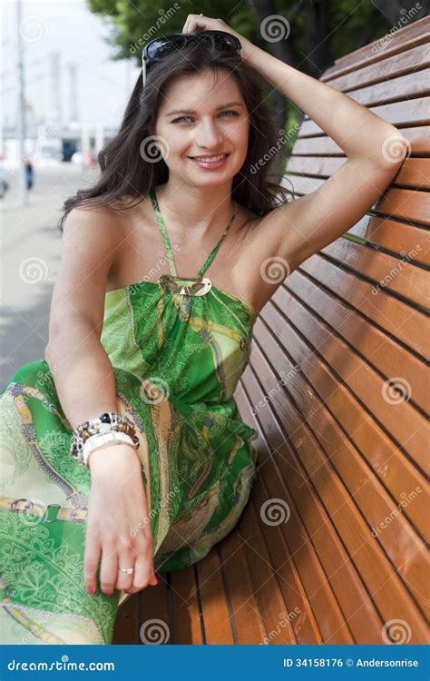 Brunette Sitting On A Bench Stock Photo Image Of Female Beauty