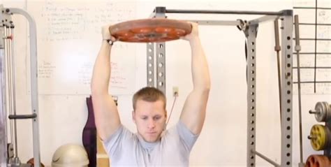 Do Front Plate Raises For Stronger Shoulders - Overtime Athletes Blog