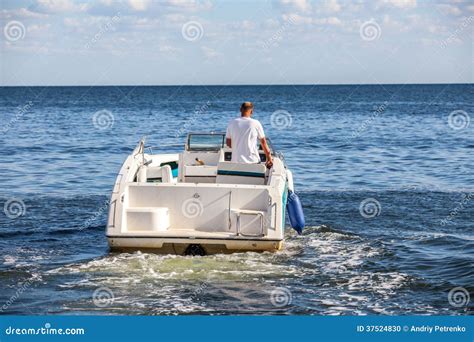 Man Driving A Fast Boat Stock Photo Image 37524830