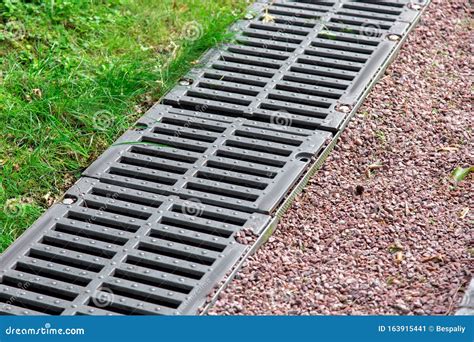 Iron Grate Of A Drainage Channel On A Landscape Stock Image Image Of