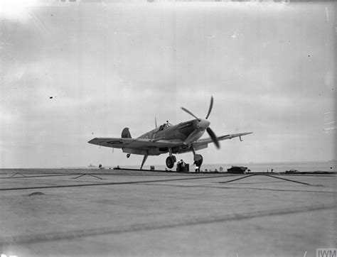 Asisbiz Fleet Air Arm Seafire Landing Aboard HMS Furious Aug 1944 IWM