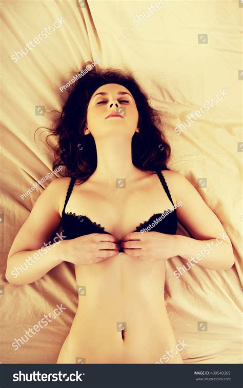 Sexy Brunette Woman Taking Off Her Stock Photo Shutterstock