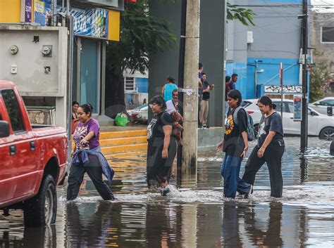 Caos por lluvia en Cancún Agencia 24mm