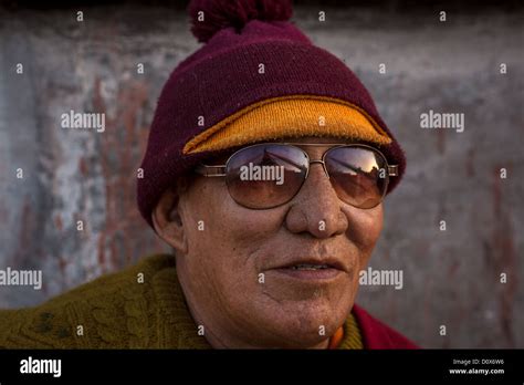 Buddhist Monk With Sunglasses Which Reflects Boudnath Stupa Boudnath