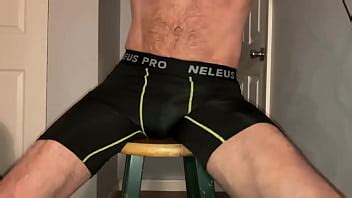 Stretching With Workout Shorts And Massage Balls On Stool XVIDEOS