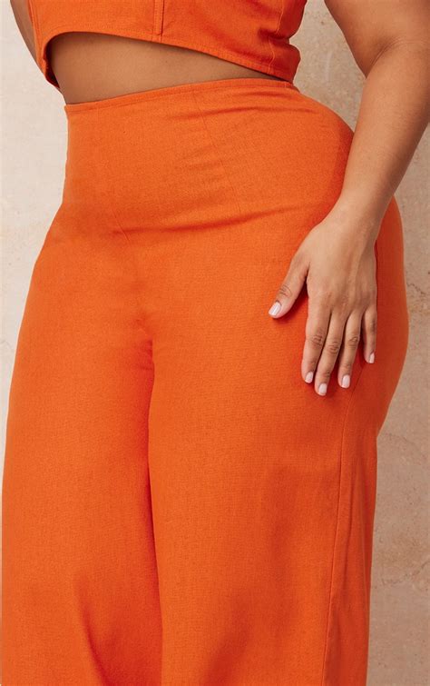 Plus Rust Wide Leg Pants Plus Size Prettylittlething Usa