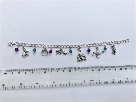 Silver Jasmine Charm Bracelet Inspired By Disney S Aladdin Disney Princess Themed Bracelet Etsy Uk