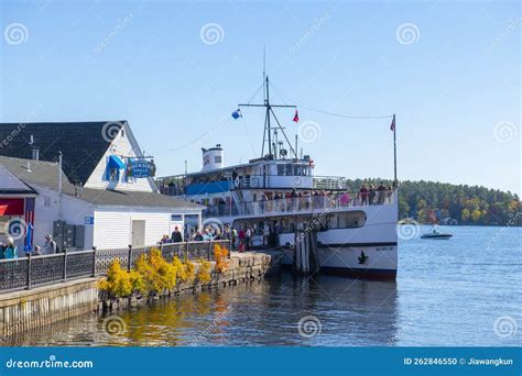 View The Winnipesaukee Pier And Boats Docked On Lake Winnipesaukee In